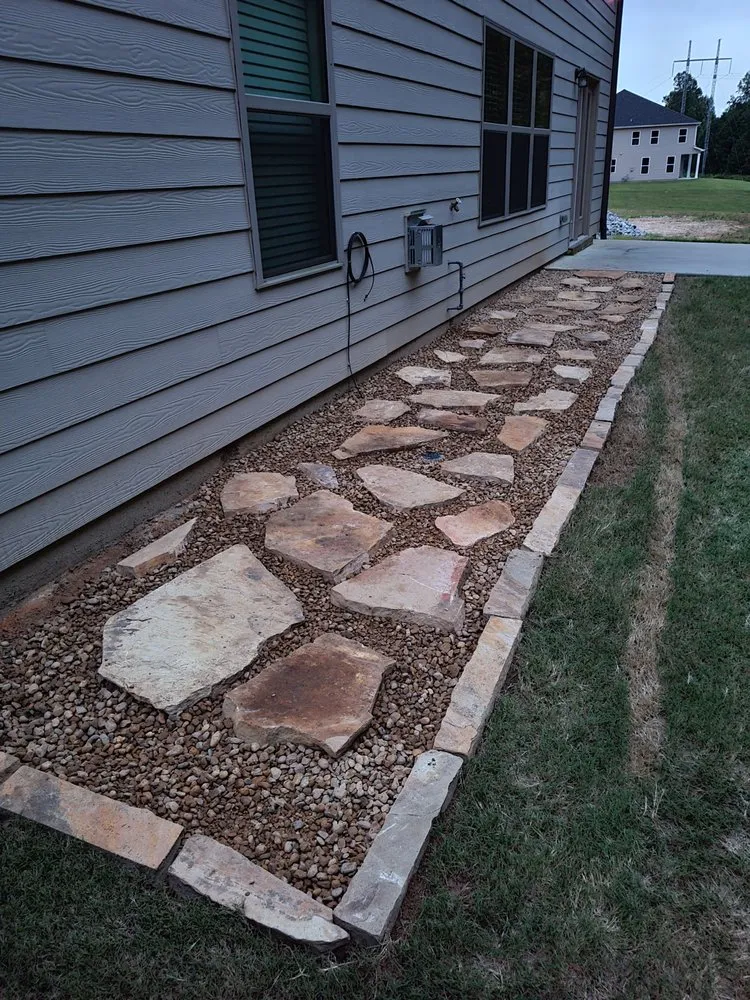 Reliable lawn care service experts serving Loganville, GA - Outdoor Living Landscape & Design