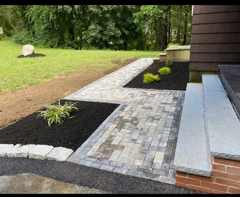Expert yard cleanup service for outdoor upgrades in Lowell, MA by Outdoor Masonry Landscaping