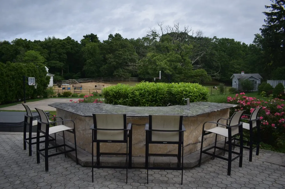 Expert yard maintenance in Commack, NY by Outdoor Masters