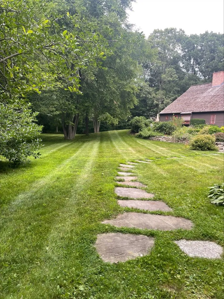 Affordable lawn care service for beautiful yards across Madison, CT - Outdoor Oasis EV
