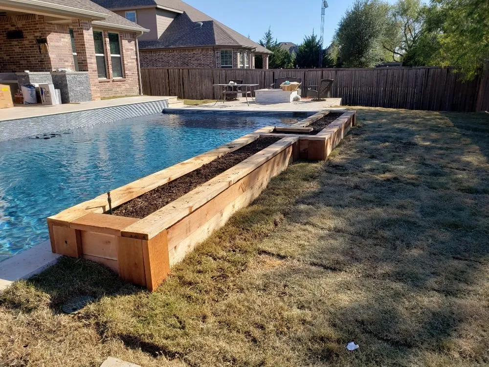 Custom garden landscaping with custom design in Bixby, OK by Outdoor Orchestrators