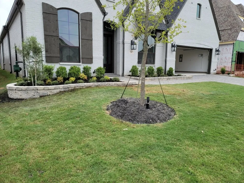 Custom residential landscaping in Bixby, OK by Outdoor Orchestrators