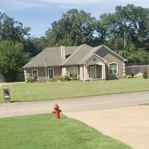 Custom lawn mowing service for residential properties across Sherwood, AR - Outdoor Pro Maintenance