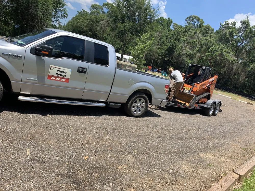 Trusted lawn mowing service in Mobile, AL by Outdoor Services