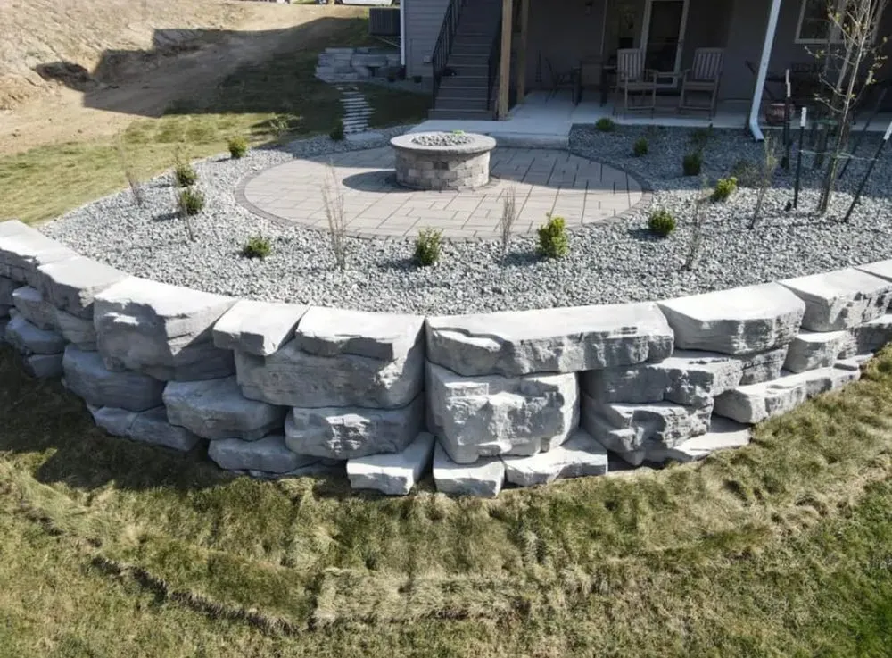 Professional lawn care service for year-round maintenance in West Des Moines, IA by Outdoors By JK