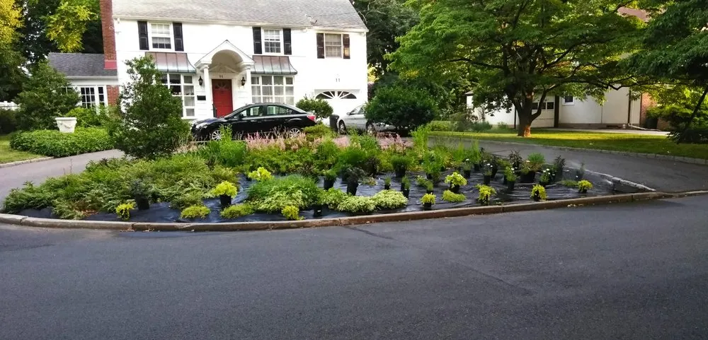 Custom outdoor landscaping in East Brunswick, NJ by Outdoorspaces Landscape Design & Build Services