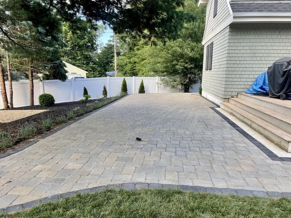 Custom landscaping services for residential properties in Salem, MA by Outdoorx