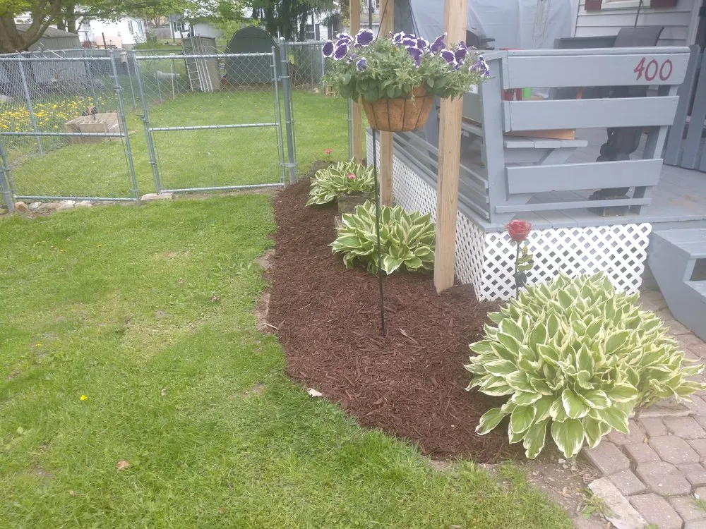 Affordable lawn care service for year-round maintenance in Fremont, IN by Outlaw Landscaping & Lawn