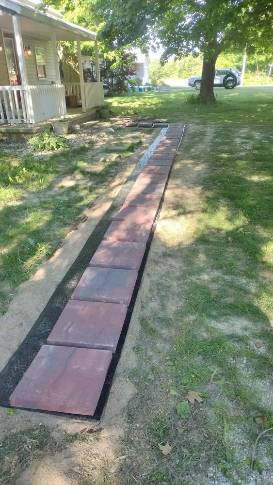 Professional lawn care service for year-round maintenance in Fremont, IN by Outlaw Landscaping & Lawn