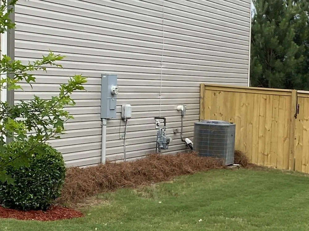 Custom yard cleanup service with custom design in Carrollton, GA by Outlaw Landscaping