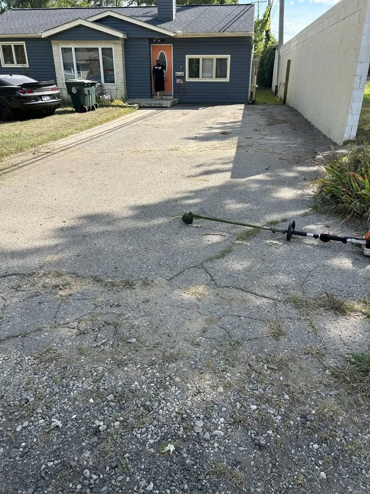 Custom lawn mowing service with custom design across Pontiac, MI - Outside Guy