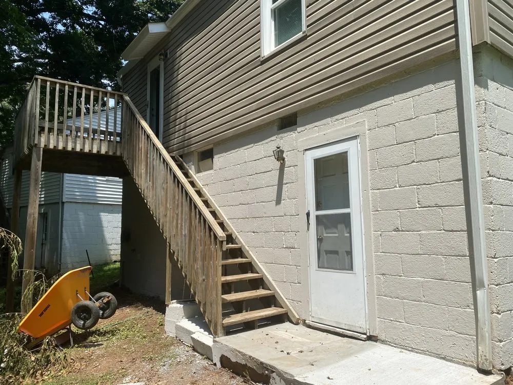 Affordable yard cleanup service for homes across Lynchburg, VA - Over Edge Lawn Solutions