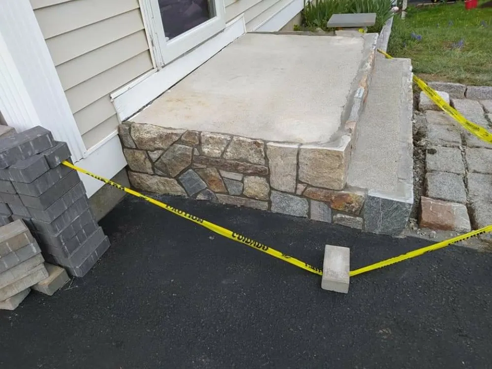 Professional lawn mowing service for beautiful yards across Branford, CT - Over the Hedge Masonry & Landscaping