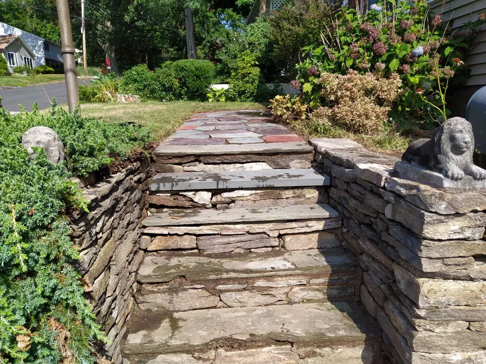 Top-rated outdoor landscaping for year-round maintenance across Branford, CT - Over the Hedge Masonry & Landscaping