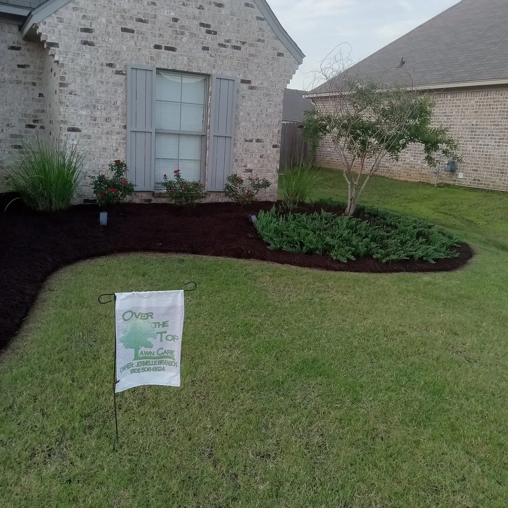 Custom lawn mowing service with custom design across Madison, MS - Over The Top Lawn Care