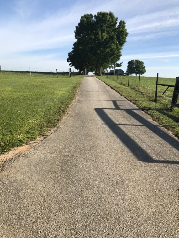 Custom landscape design for residential properties in Summerdale, AL by Overstreet Sealcoating