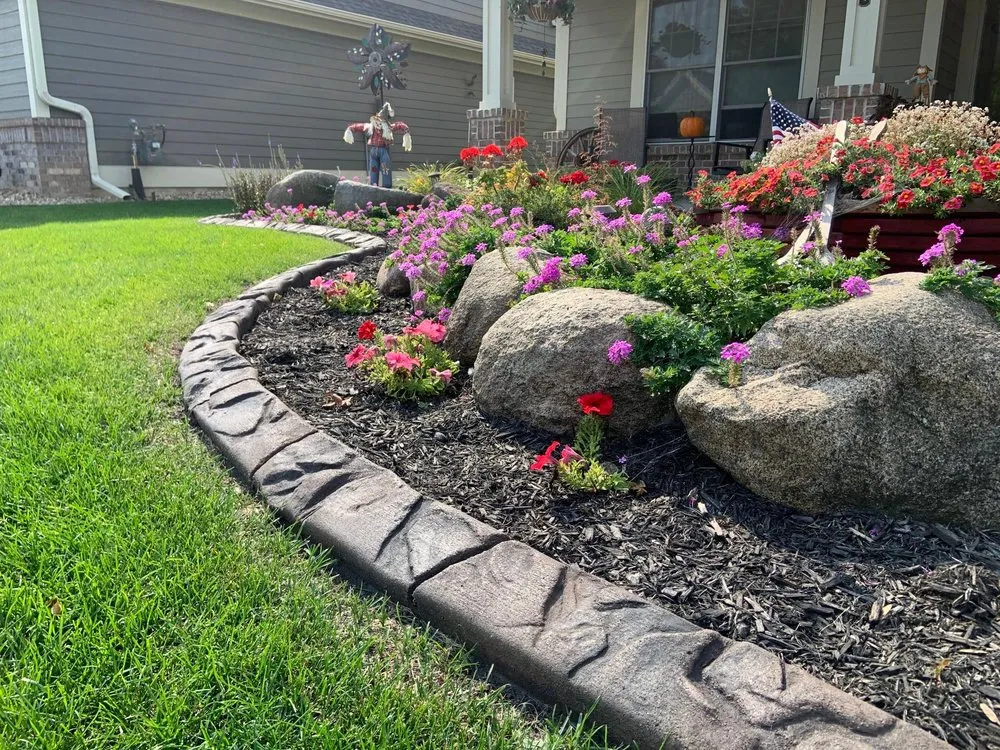 Custom outdoor landscaping in Owatonna, MN by Owatonna Groundsmasters