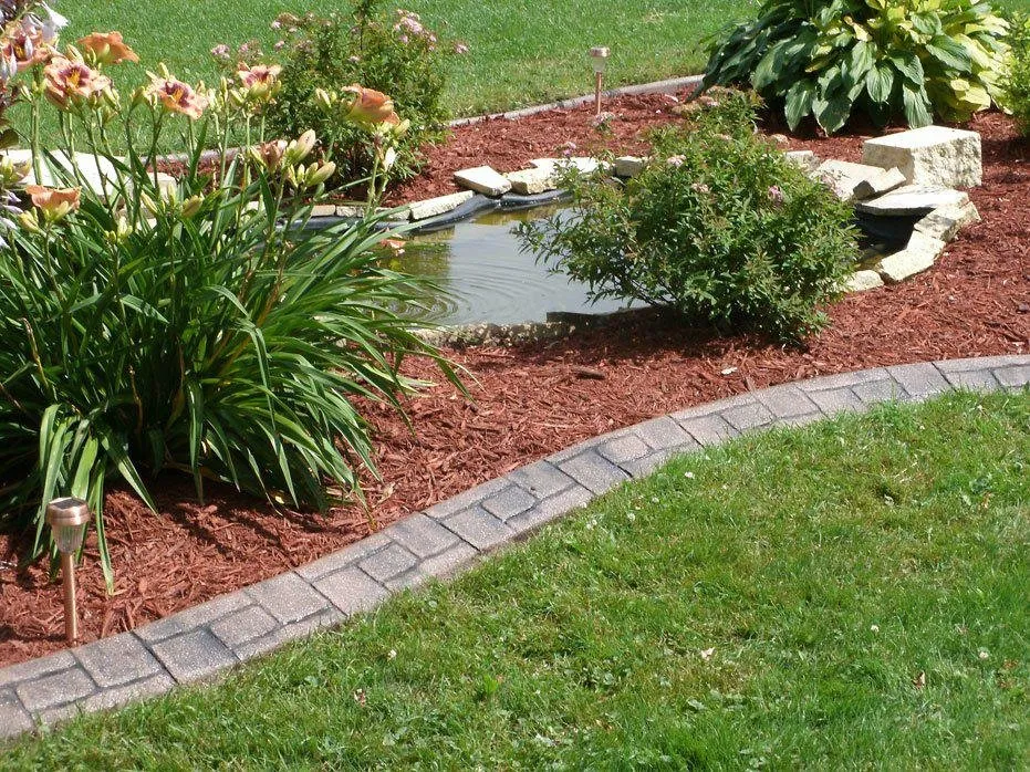 Trusted landscape design for homes in Owatonna, MN by Owatonna Groundsmasters