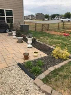 Expert yard maintenance with custom design in Iron Station, NC by Owens Lawn Service