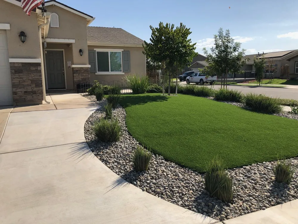 Expert lawn mowing service for residential properties in Bakersfield, CA by O.W.O Landscaping