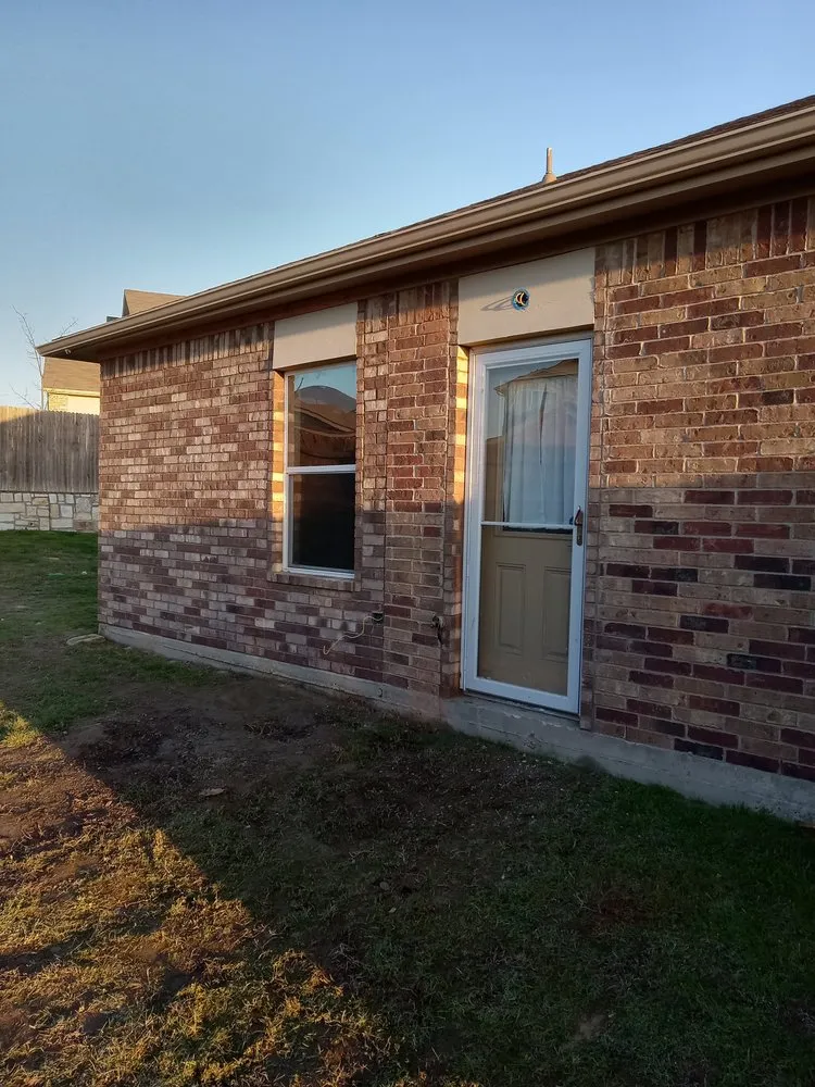 Custom lawn mowing service for residential properties across Cedar Creek, TX - Oxpro Custom Masonry