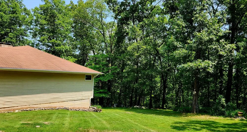 Professional landscape design for year-round maintenance across Roach, MO - Ozark Mowing