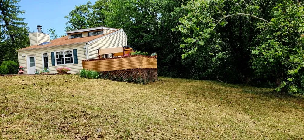 Professional lawn mowing service with custom design across Roach, MO - Ozark Mowing
