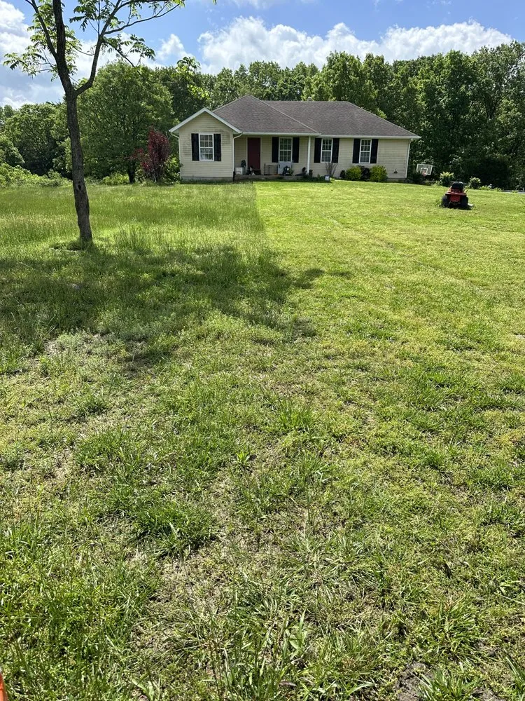 Professional landscape installation with custom design in Sparta, MO by Ozarks Lawn Care