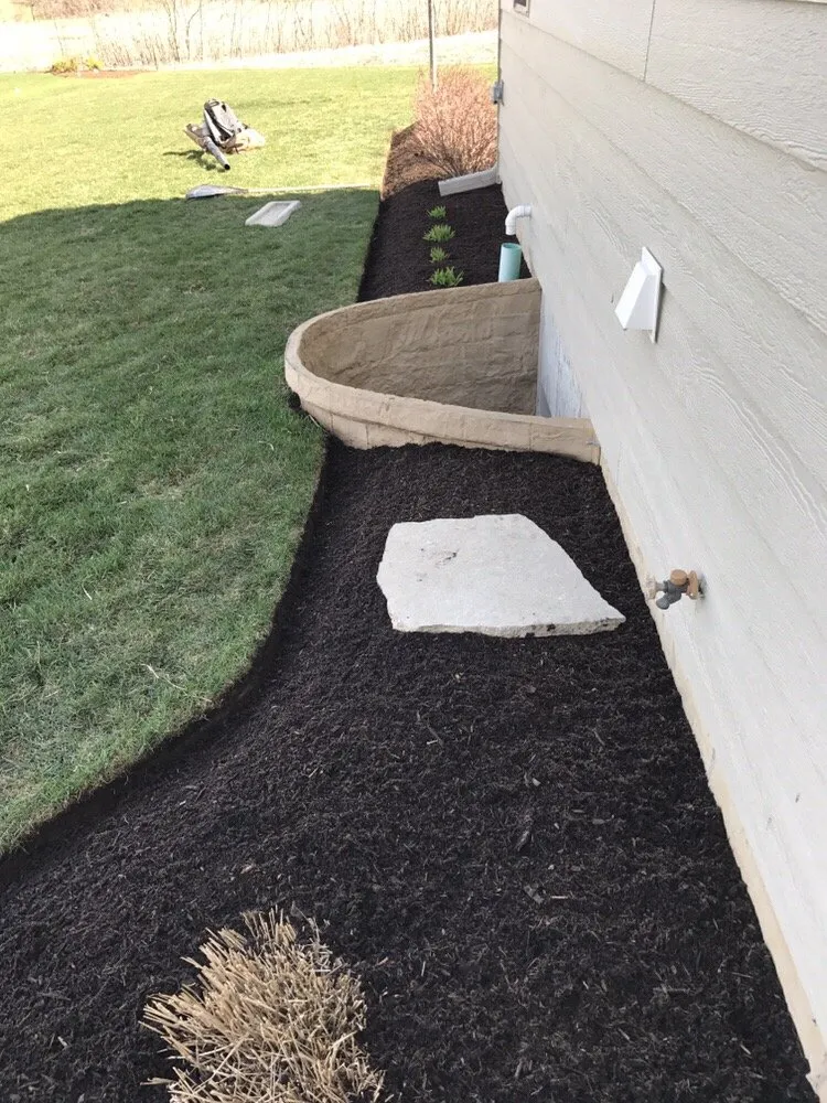 Custom garden landscaping for year-round maintenance across Elgin, IL - Ozzie's Landscaping