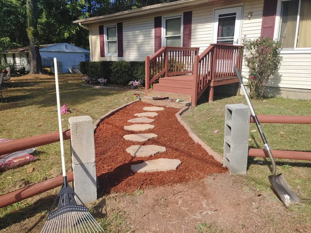 Custom lawn mowing service for homes in Mathews, VA by P & H Enterprise