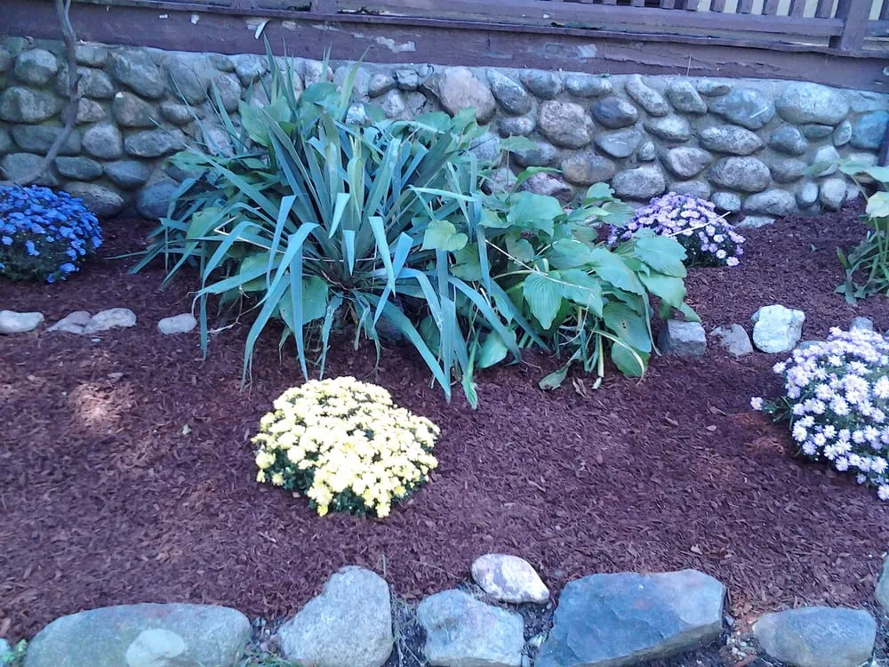 Custom landscape installation for residential properties in Newton, MA by P.A. Landscaping & Home Improvement
