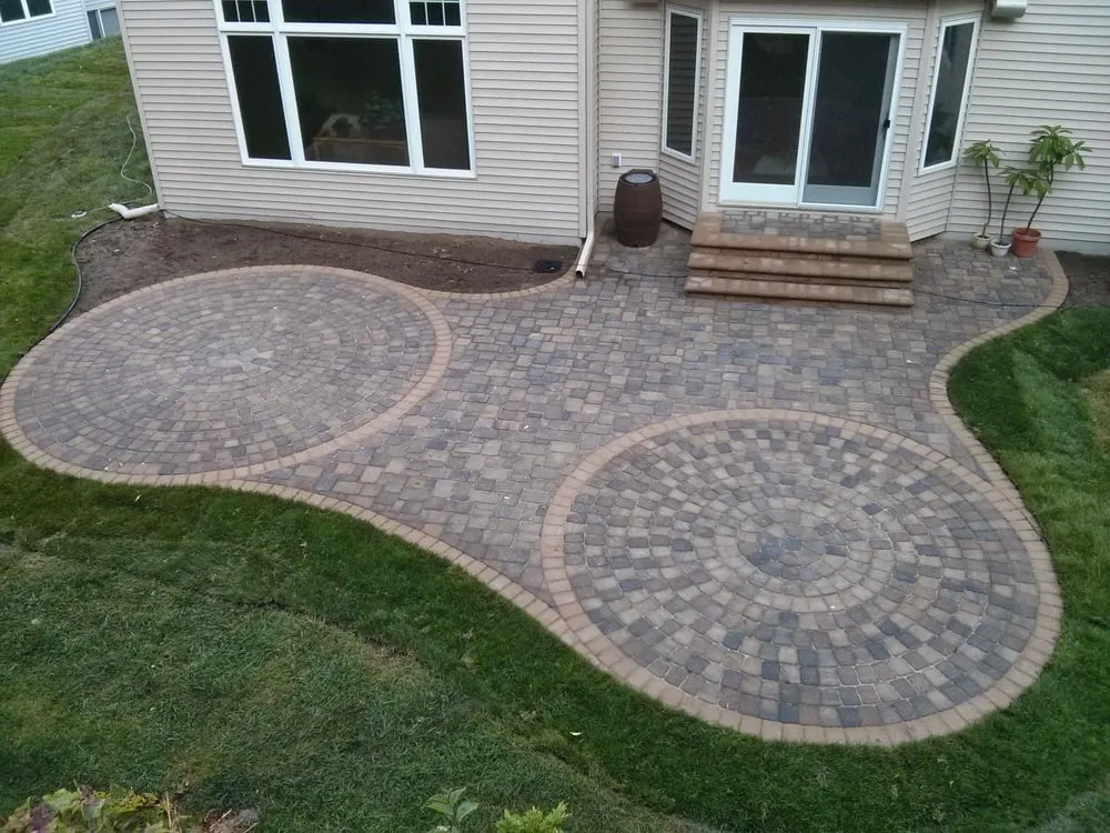 Affordable yard cleanup service for year-round maintenance across Inver Grove Heights, MN - Pace Landscape & Design