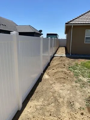 Pacheco’s Lawn Care & Fencing Logo