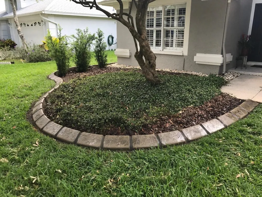 Professional outdoor landscaping for residential properties in Land O Lakes, FL by Pacific Curbing
