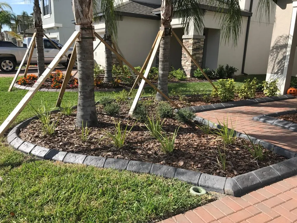 Professional residential landscaping for residential properties in Land O Lakes, FL by Pacific Curbing