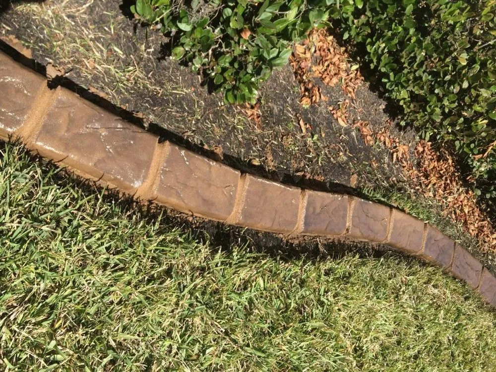 Custom landscape design for residential properties across Land O Lakes, FL - Pacific Curbing