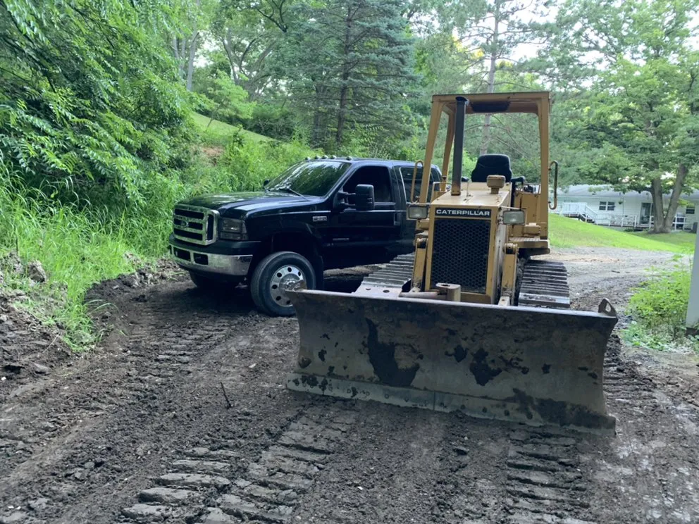 Reliable lawn mowing service for homes in Howell, MI by Pacitto & Waker Construction