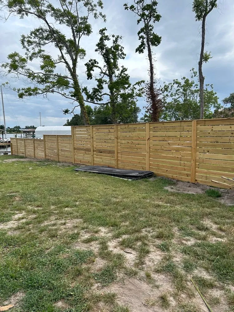 Professional landscape design for year-round maintenance in Santa Rosa Beach, FL by Pack Fencing