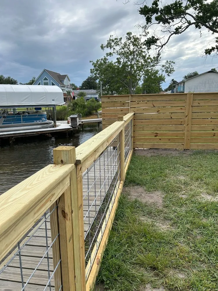 Reliable lawn mowing service in Santa Rosa Beach, FL by Pack Fencing
