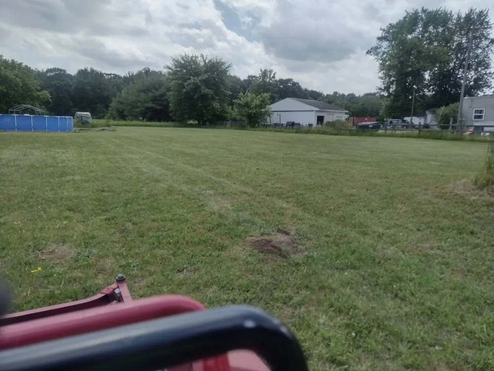 Professional yard maintenance in Kent City, MI by Packard Lawncare