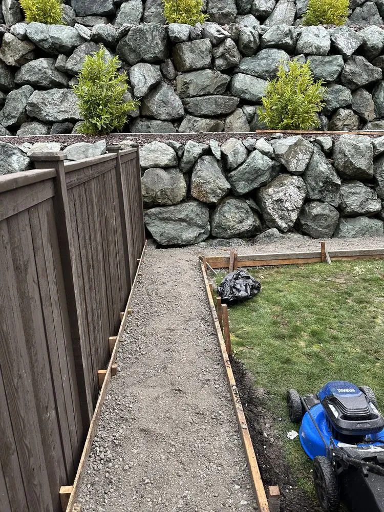 Professional landscaping services for residential properties in Lakewood, WA by Paea Concrete