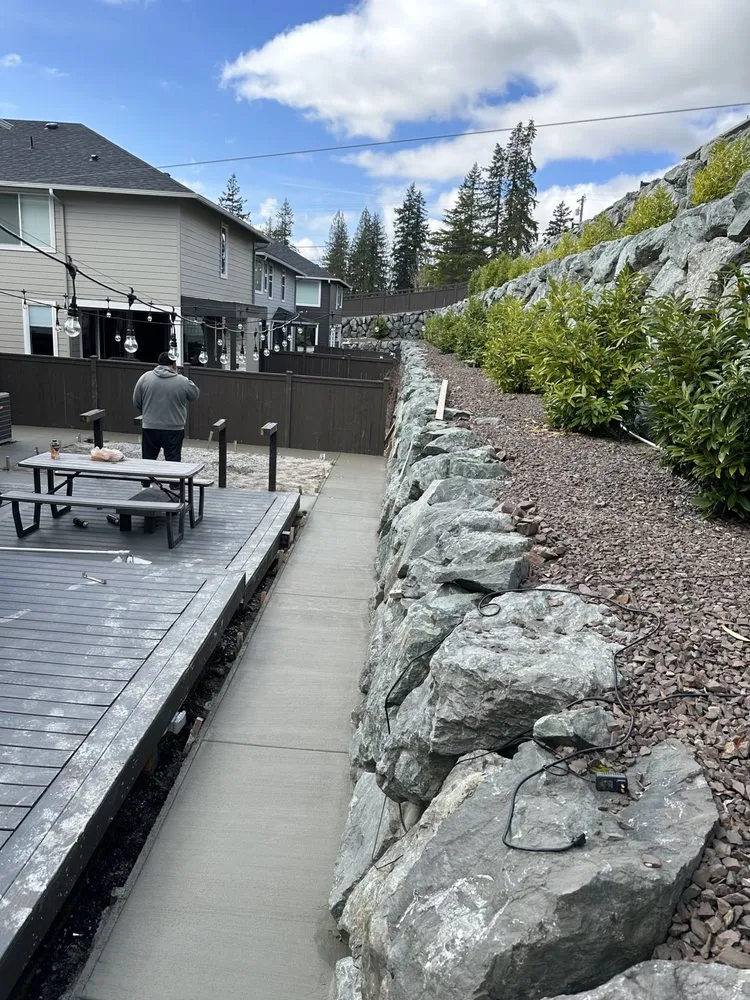 Expert outdoor landscaping for year-round maintenance in Lakewood, WA by Paea Concrete