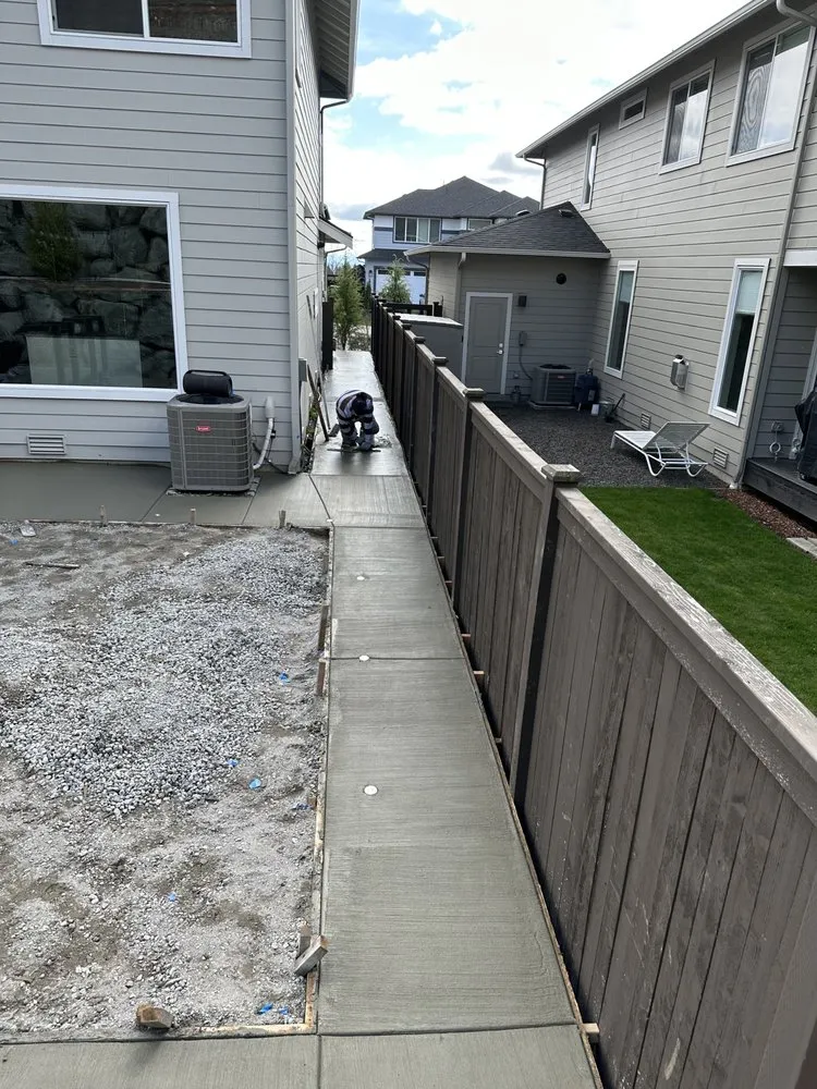 Local landscape installation with custom design in Lakewood, WA by Paea Concrete