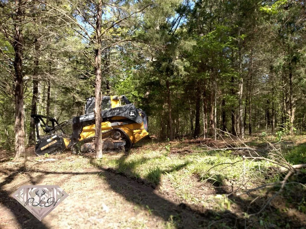 Custom yard maintenance for residential properties in Gilmer, TX by Pafford Land & Home