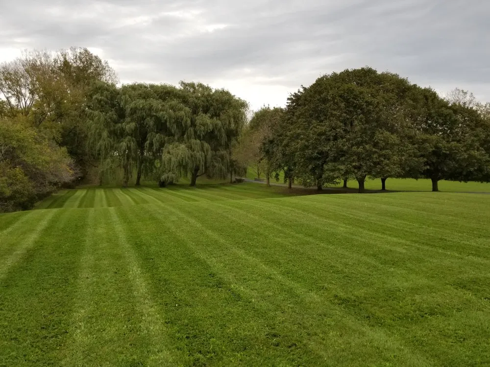 Top-rated lawn mowing service for residential properties in West Henrietta, NY by Pahuta Lawn Care
