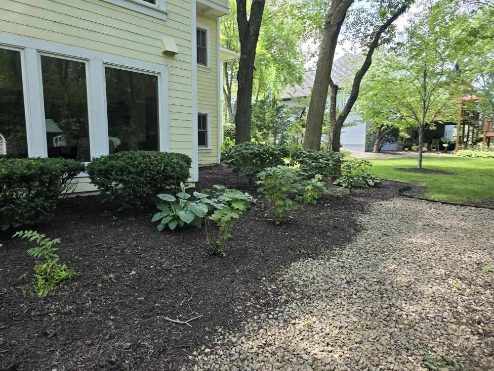 Professional garden landscaping for beautiful yards across Olathe, KS - Palatial Lawn & Landscape