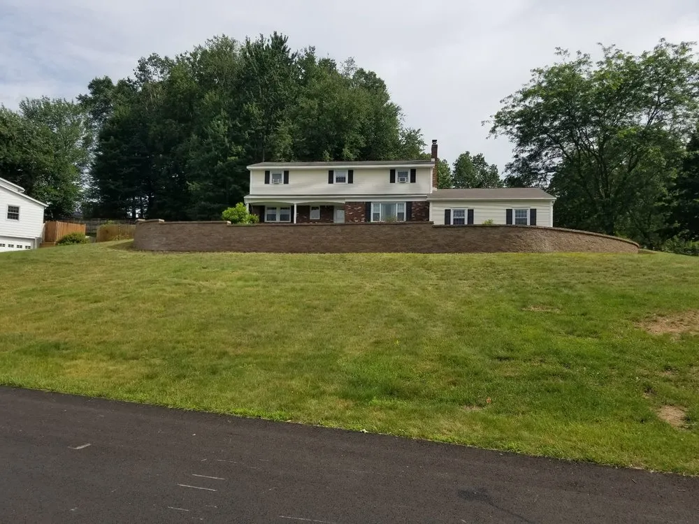 Affordable lawn mowing service for homes in Mechanicville, NY by Palazzo Landscaping & Design Services