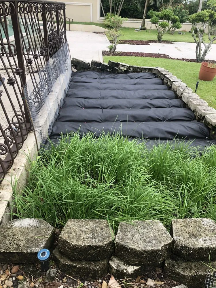 Reliable yard cleanup service for homes in Lake Worth, FL by Palm Beach Gardening & Design