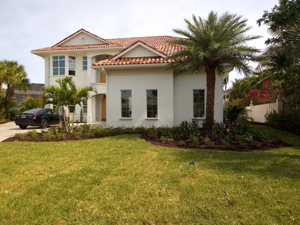 Professional landscape installation for residential properties in Vero Beach, FL by Palm Coast Lawn And Landscape
