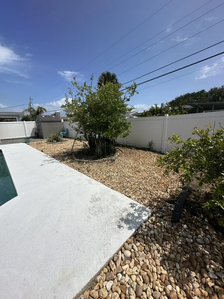 Local yard cleanup service for homes in Ormond Beach, FL by Palm Pros